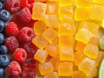 A colorful arrangement of freeze-dried fruit candies, capturing their vibrant appearance and natural appeal for active children seeking a healthy snack option.