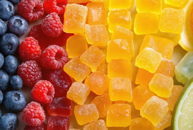 A colorful arrangement of freeze-dried fruit candies, capturing their vibrant appearance and natural appeal for active children seeking a healthy snack option.